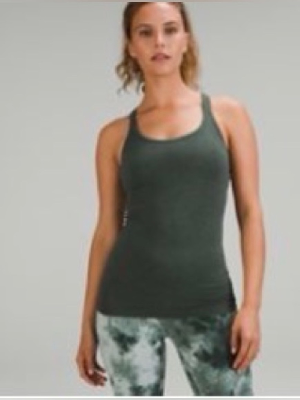 Lululemon Ebb to Street Tank. Size 6. Green color. Excellent condition
